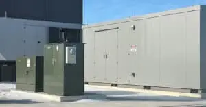 a green box next to a building